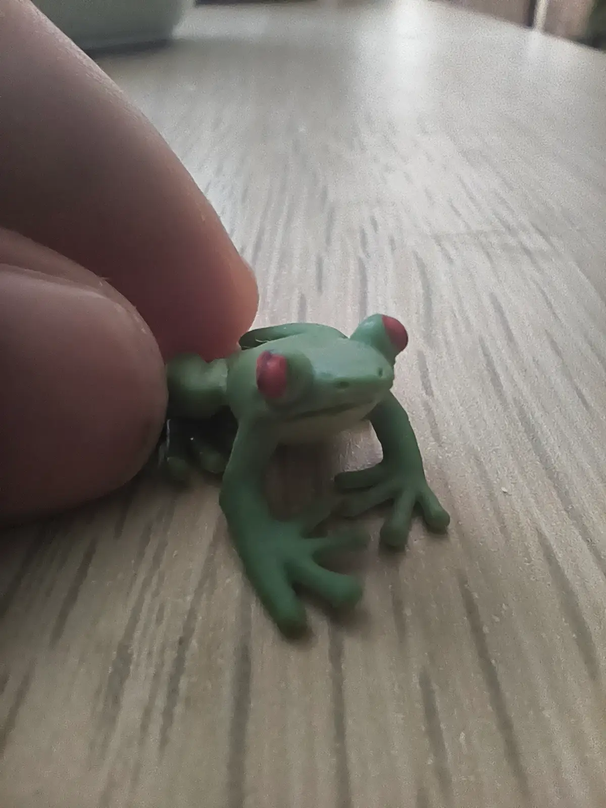 Tiny rubber frog